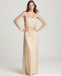 Utterly ethereal, this Aidan Mattox gown of sheer silk is subtly embellished with sparkling rhinestiones.