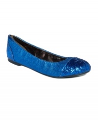 Catch eyes and turn heads as you sparkle past in the glittery Flicker ballet flats by Material Girl.