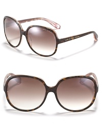 Go glam in round oversized tortoise sunglasses from MARC BY MARC JACOBS.