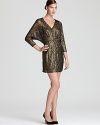 Dolman sleeves lend a laid-back look to a shimmering lace Trina Turk dress.