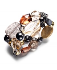 On the double. Two rows of beautiful beads comprise this striking stretch bracelet from Style&co. Crafted in hematite tone mixed metal, it's embellished with acrylic beading. Bracelet adjusts to fit wrist. Approximate length: 7-1/2 inches.