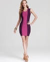 In a fitted, knit silhouette, BCBGMAXAZRIA's color blocked dress lends a bold look in a bordeaux hue.