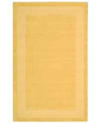 In sunny yellow, this bright rug adds some cheer to every space. A distinctive center grid gives the rug a delightful texture while coordinating well with both traditional and modern interiors. Hand-tufted of wool for premium softness and durability.