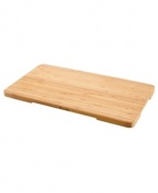 Regain lost counter space with this handy cutting board, crafted in bamboo wood to resist cuts marks and stand the test of time. Great as a cutting board, trivet or serving tray, this versatile essential features heat-resistant feet that stabilize it on top of your toaster oven, so you can slice, dice & prep all in one place. One-year limited warranty.