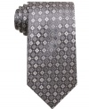 Add some dimension to your look with this distinguished patterned tie from Tasso Elba.