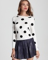 Polka dots aplenty are accented with black rhinestones in this playful essential from Alice + Olivia.