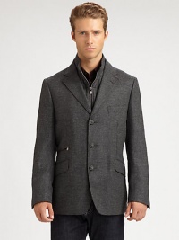 Inspired from the traditional look and feel of checked tweed, this three-button jacket is shaped in the supreme softness of a wool and cashmere blend, featuring a zip-out front vest panel and an additional front ticket pocket.Button-frontNotch lapelChest welt, waist flap pocketsSide vents94% wool/6% cashmereDry cleanMade in Italy