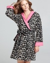 Betsey Johnson adds her signature flair to the all-essential fleece robe with a wild print and contrast cuffs.