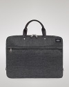 Comport yourself with the casual distinction of Jack Spade when you carry this cool and classic brief, furnished with a laptop compartment inside to hold your valuable hardware.