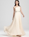 Pretty pleats lend a graceful look to a one shoulder silhouette from SW Studio by Sue Wong.