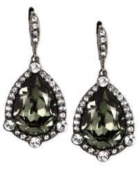 A proper mix of subtle and bold. Givenchy's drop earrings, crafted from hematite-tone mixed metal, feature a dark glass crystal stone in the center offset by lustrous accents. Approximate drop: 4 inches.