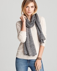 Sequin your seasonal style with this glittering, open-knit scarf from Aqua.