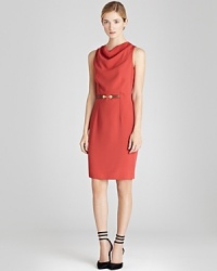 With a delicious drape, subtle shaping seams and a golden belt clasp, this woven REISS day dress is perfectly appointed for the office or Sunday brunch.