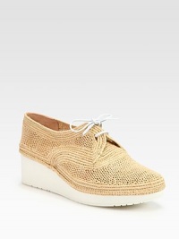 Elevated silhouette of breathable crochet raffia with smooth leather laces. Rubber wedge, 1½ (40mm)Rubber platform, ½ (15mm)Compares to a 1 heel (25mm)Crochet raffia upper with leather lacesLeather liningRubber solePadded insoleMade in France