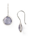 Coralia Leets has refined daytime jewelry by blending natural stones with elegantly simple construction. Here the designer combines mystic and sterling silver to create a pair of delicate drop earrings.