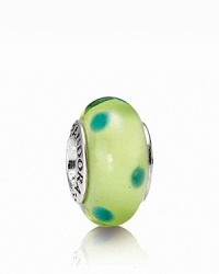 A whimsical murano glass charm with a playful polka dot pattern. Logo-engraved sterling silver trim displays the PANDORA signature.