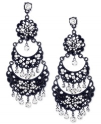 Ornate elegance. This pair of chandelier earrings from Betsey Johnson is crafted from black-plated mixed metal with glass crystal accented-filigree tiers for a stunning statement. Approximate drop: 3-1/4 inches.