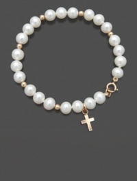 A petite pearl bracelet offers a traditional way to show your faith. This bracelet for children features a delicate strand of cultured freshwater pearls (5-6 mm) with a 14k gold dangling cross charm and accent beads. Set in 14k gold. Approximate length: 6 inches. Approximate drop: 1/2 inch.