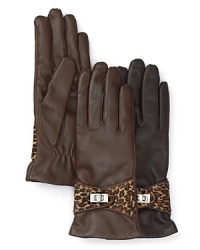 Exotically embellished, Labonia's cashmere-lined leather gloves are buckled with a leopard-print pony hair strap.