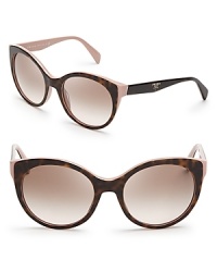 Prada brings its elegant aesthetic and mastery of '50s style to the ultra-fashionable cat eye in these appealing sunglasses.