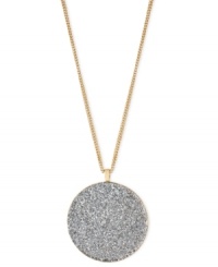 Kenneth Cole New York comes full circle. This necklace, crafted from gold-tone mixed metal, features a sparkling silver-colored glitter pendant. Item comes packaged in a signature Kenneth Cole New York Gift Box. Approximate length: 16 inches + 3-inch extender. Approximate drop: 2-1/10 inches.