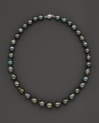 Darkly shimmering Tahitian pearls with 14K. white gold.