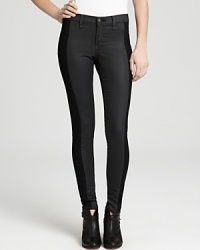 These stretch rag & bone/JEAN skinny jeans feature a sleek coating for shine, while a matte black stripe at the sides provides a standout contrast. Definitively edgy, rock the look with a tissue-thin tee and lace-up booties and head directly downtown.