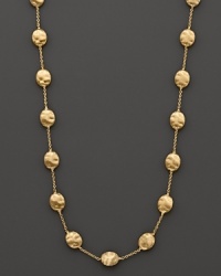 From the Siviglia collection, a necklace with large-sized beans, designed by Marco Bicego.