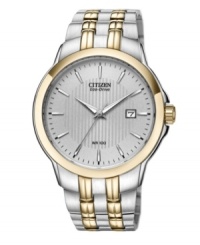 Golden shine enhances the sleek craftsmanship of this Citizen Eco-Drive watch.