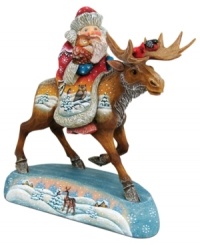 Santa forgoes the comfort of his sleigh for a moose in this elaborate figurine from DeBrekht. The sights he sees are echoed in beautiful scenes hand painted on the animal and stand below.