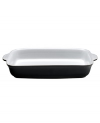 Perfect for everyday use, this rectangular baker boasts sublime versatility in ultra-durable stoneware from Denby dinnerware. The dishes have a jet-black surface and glossy white interior that can carry easy, modern polish from oven to table.