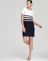 Punctuated stripes lend a timeless look to this Anne Klein dress, rendered in an effortless t-shirt silhouette.