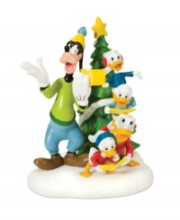 Goofy and Daffy lead three young ducks in cherished Christmas carols. Posing in front of a star-topped tree, these favorite characters add a silly, joyful note to Mickey's Village. From Department 56.