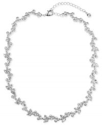 This feminine floral crystal necklace from Givenchy sits at the neckline for stunning finishing touch. Silvertone. Length measures 15-1/2 inches with adjustable chain to 18-1/2 inches.