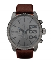 If bigger is better, this modern watch by Diesel is the best. Brown leather strap and oversized round gunmetal ion-plated stainless steel case, 58x52mm. Gunmetal chronograph dial features charcoal numerals, stick indices, minute track, three subdials, luminous hands and logo. Quartz movement. Water resistant to 50 meters. Two-year limited warranty.