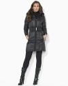 Faux-fur trim lends luxe style to a classic jacket, cut for a flattering fit with a belted waist in sleek microfiber.