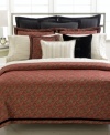 Lauren Ralph Lauren's Bleecker Street-inspired duvet cover creates a distinctly rich ambiance. Features a deep red paisley pattern and black velvet ribbon frame on the front. Reverses to solid; top hidden button closure. (Clearance)