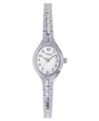 A classic everyday style from Caravelle by Bulova. Watch features a mixed metal bracelet and case. White dial with logo and silvertone numerals. Quartz movement. Water resistant to 30 meters. Three-year limited warranty.