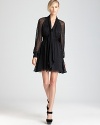 Stylishly spotted, this Rachel Zoe dress boasts plush burnout dots, sheer sleeves and a flowing, feminine silhouette.