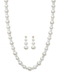 Add ultimate sophistication to your look. This stunning jewelry set features a matching pearl strand necklace and drop earrings with large and small cultured freshwater pearls (4-10 mm). Set in 14k gold. Approximate length: 18 inches. Approximate drop: 1-1/2 inches.