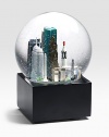 EXCLUSIVELY OURS. The musical Houston globe showcases landmark sites including:  NASA, the financial building, San Jacinto monument, Williams Tower and more.  Plays Deep In The Heart of Texas.  6 high.  Imported Glass globe, resin figures.