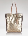 This Sam Edelman tote has a wild side. Coolly crafted in a snakeskin print, its exotic look will carry you miles and instantly update your daytime outfits.