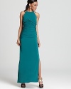 This Laundry by Shelli Segal gown brings glamour with dramatic ruching and sparkling shoulder straps.