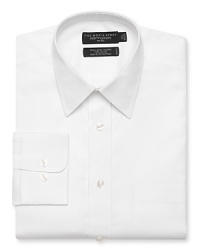 Long sleeve dress shirt with spread collar. Single needle tailoring, angle cut barrel cuffs with two buttons to resize width. Chest pocket. Textured solid white.