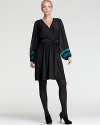 Crisp color blocking punctuates the oversized sleeves of a flowing Taylor Dresses Plus wrap dress for a retro style statement. Layer over black tights for a glamorous take on groovy.