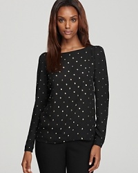 Gold-tone studs punctuate the clean silhouette of this VINCE CAMUTO blouse for a polished office essential with touch of punk.