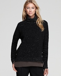 This tweedy knit Vince sweater, constructed from a speckled blend of wool and cashmere, is the cozy-chic must-have to revitalize fall wardrobe.