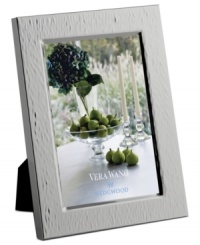 Moments of brilliance. This hammered picture frame from Vera Wang Wedgwood adds texture and shine to beautiful snapshots in polished silver plate.