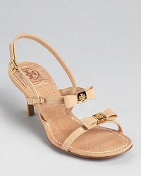 Ladylike bows add a delicate touch to the Tory Burch Kailey sandals, offering a dressed up look that's comfortable with a 2.5 heel.