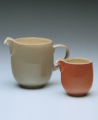 Warm, natural colors and a retro feel combine in this modern sauce jug. Large jug shown left. From Denby's dinnerware and dishes collection.